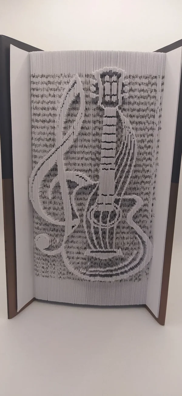 A muzsika szárnyain –Violinkulcs és gitár könyvszobor