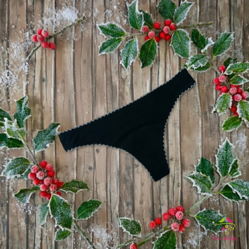 Fekete menstruációs tanga enyhe vérzéshez – fehér csipkedísszel