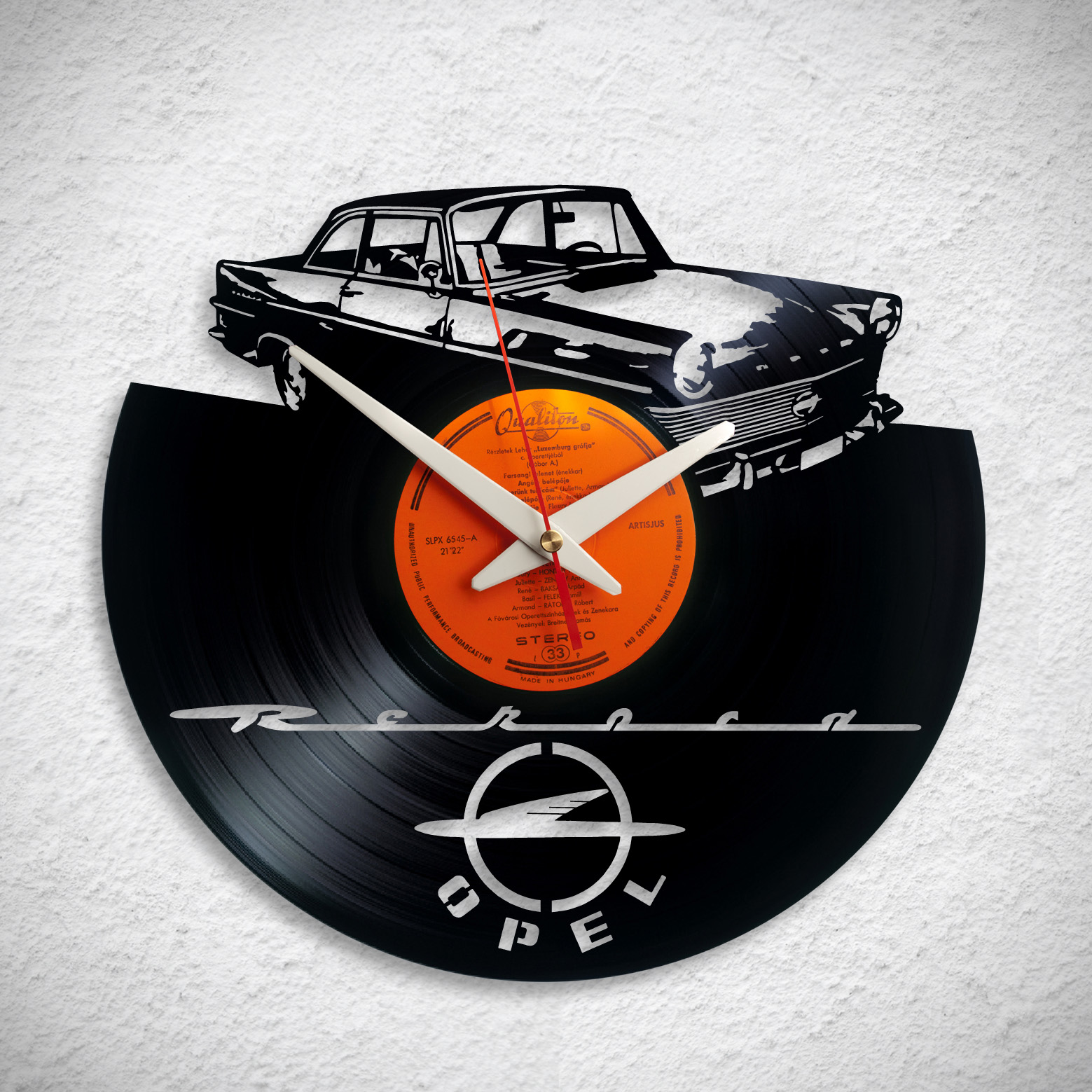 Opel Record – Bakelit falióra